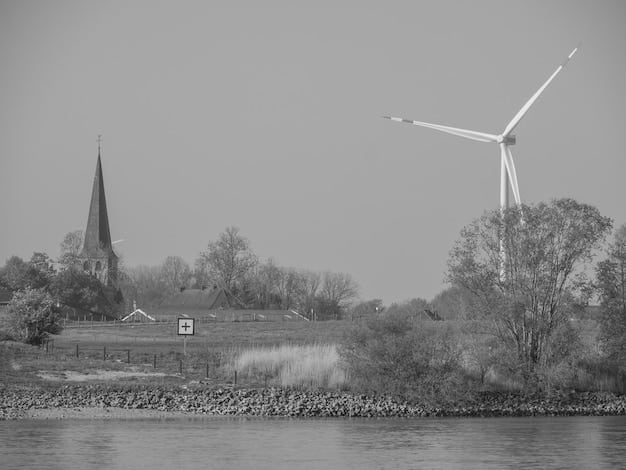 A split image contrasting a coal-fired power plant with a wind turbine farm, symbolizing the political and economic challenges in transitioning from fossil fuels to renewable energy in the United States. The image should highlight the debate and the need for balanced solutions.
