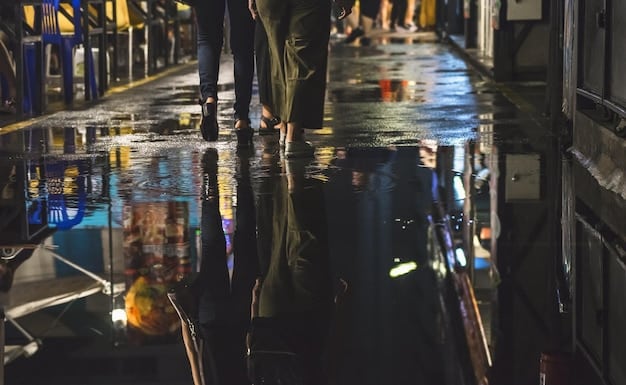 A flooded warehouse in a coastal area, with workers wading through water to salvage goods, illustrating the physical risks of climate change.