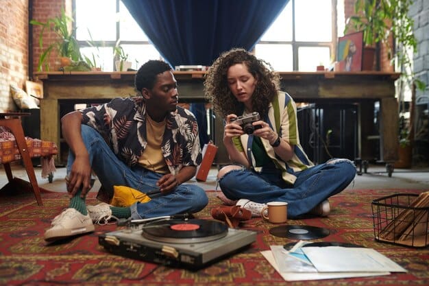 A diverse group of Gen Z friends gathered around a vintage record player, laughing and sharing headphones, surrounded by colorful vinyl sleeves in a cozy living room setting.