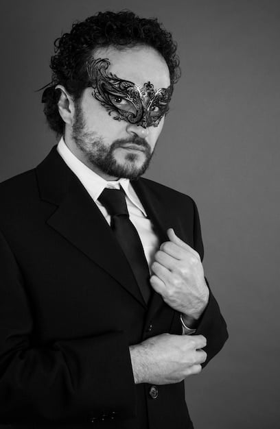 A black and white portrait of a Broadway actor known for his emotive performances. The actor has a serious expression, hinting at the depth and complexity of the roles he undertakes. This portrait represents the significant contributions of actors 'From Stage to Screen: Broadway Stars Making Waves in Hollywood This Year'.
