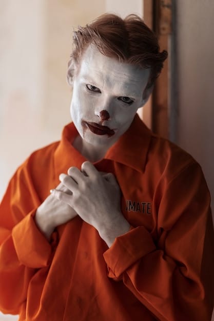 A close-up of a renowned actor in character for a gritty, emotionally charged drama. The actor's face is weathered and expressive, conveying deep inner turmoil. The lighting is dramatic, emphasizing the intensity of the performance, potentially marking him as a frontrunner in Award Season Predictions: Early Frontrunners for the 2026 Oscars.