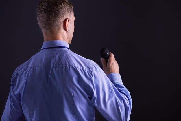 A close-up, detailed photograph of the director pointing out a specific detail on set to the director of photography, showcasing the meticulous planning and collaborative effort during the Behind the Scenes: Exclusive Interview with the Director of This Summer's Biggest Movie.