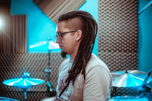 A focused portrait of a musician known for past chart-topping hits, now rumored to be working on a new album. The image should convey determination and a fresh perspective, hinting at a potential stylistic evolution. The scene should suggest their commitment to making 