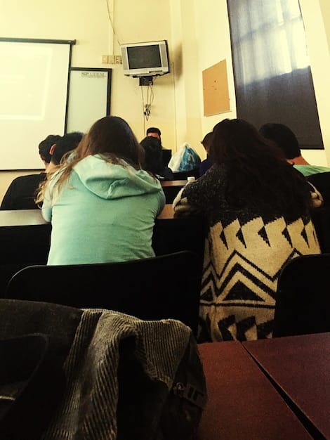A behind-the-scenes shot of a diverse writing team brainstorming ideas for a sitcom episode. The team is composed of writers from various ethnic backgrounds, genders, and ages. They are engaged in a lively discussion, with sticky notes and whiteboards filled with ideas. This image represents The Evolution of Sitcoms: How Comedy is Changing on TV in 2025 by highlighting the importance of diverse voices in content creation.